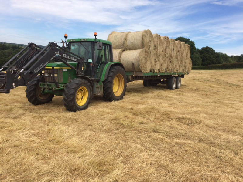 Moving round bales to storage