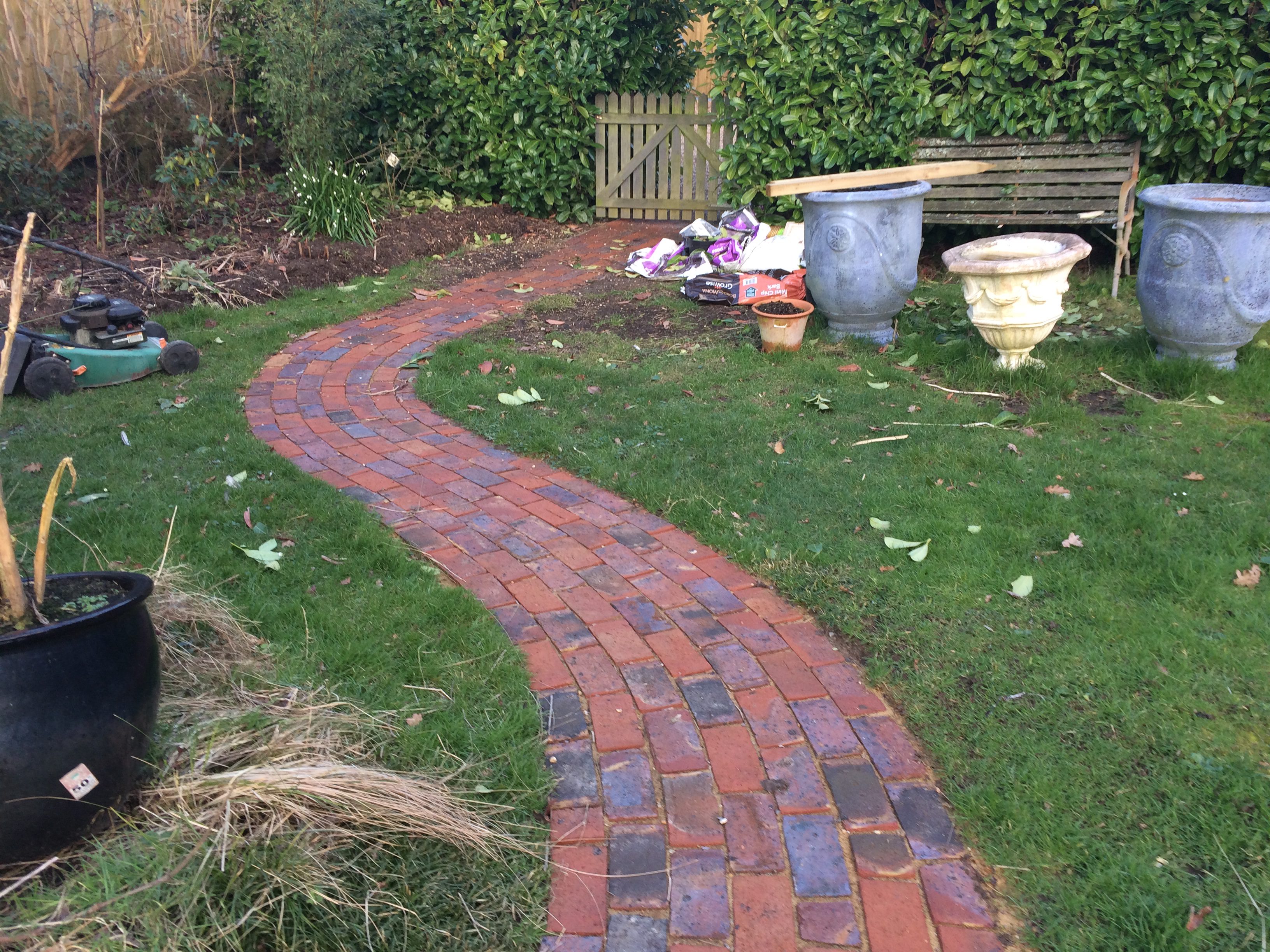 Brick path leading to a gate