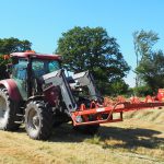 Tractor with bale grab