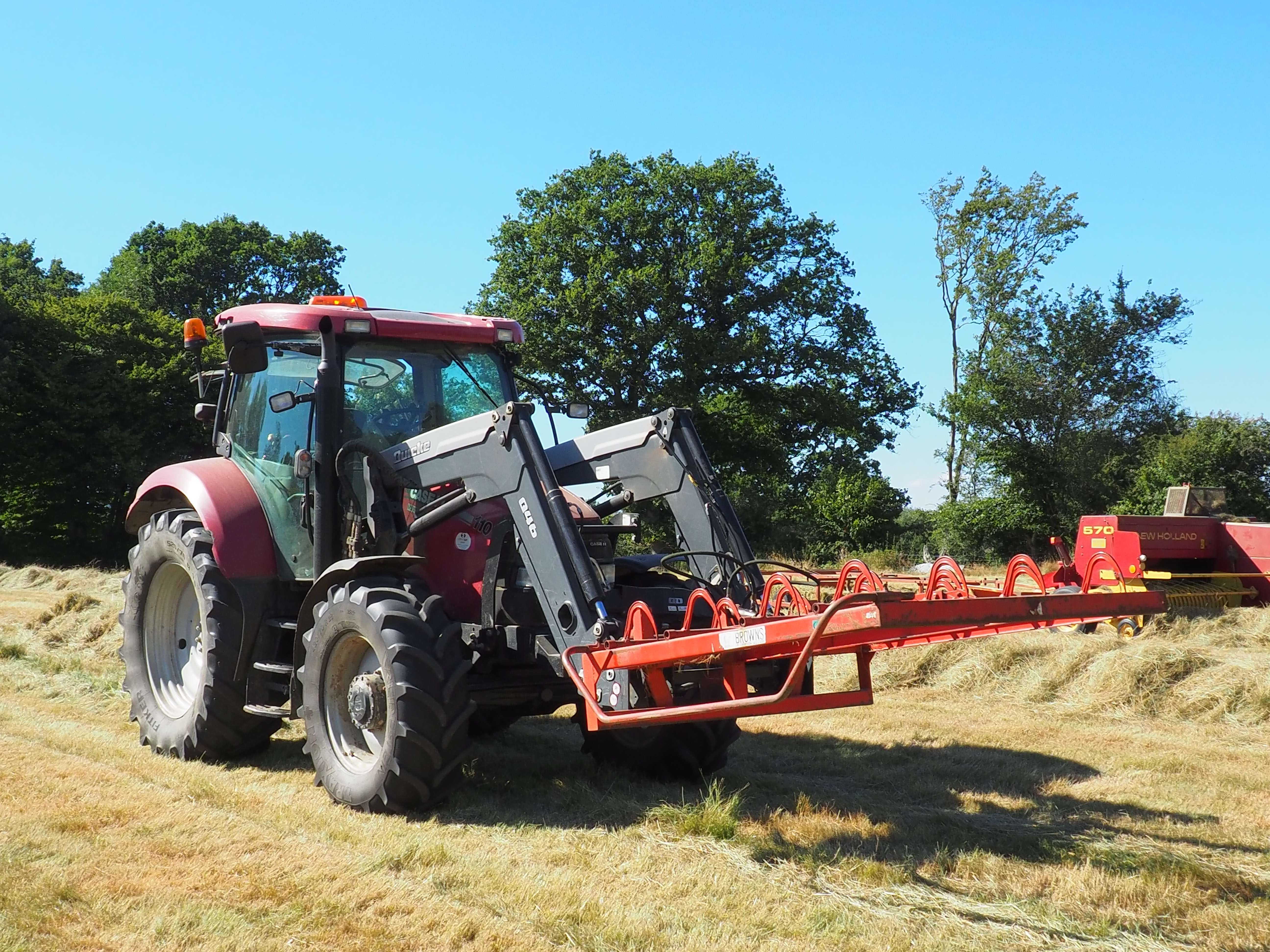 Tractor with bale grab