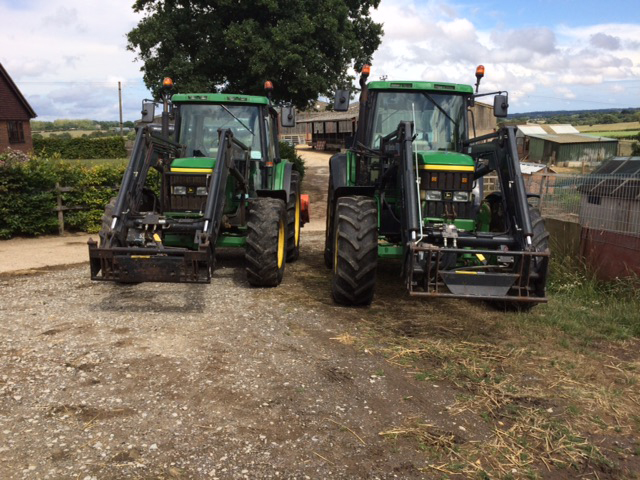 MC Contracting's two tractors in a farm yard